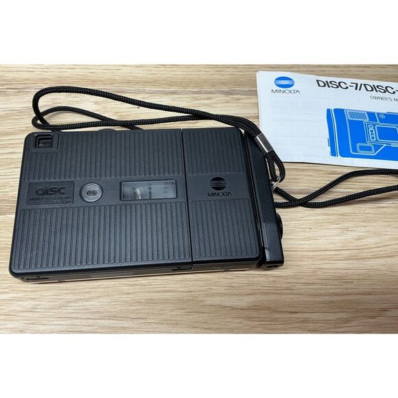 Minolta Disc-7 SELFIE MIRROR Compact Disc Film Camera Untested‎ With Manual - Picture 5 of 8